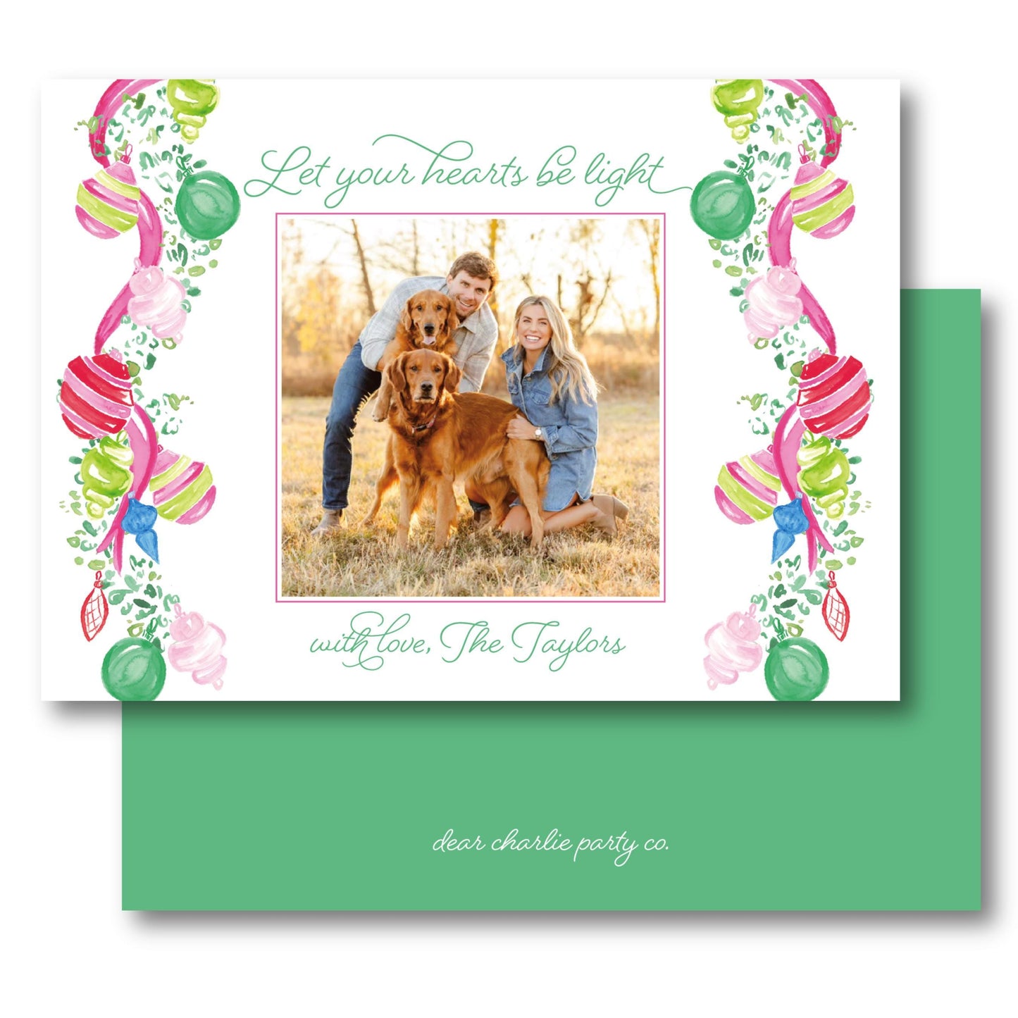 a card with a picture of a couple and their dog