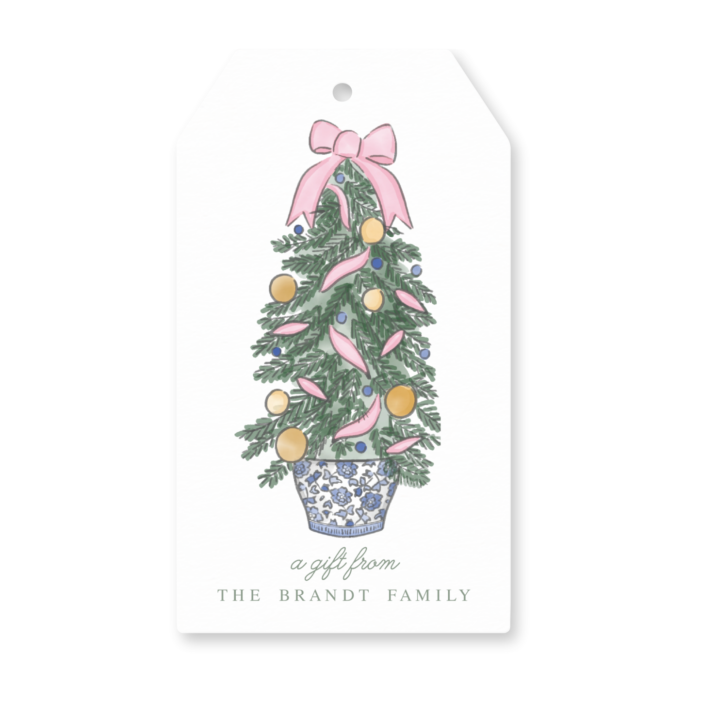 a gift tag with a christmas tree on it