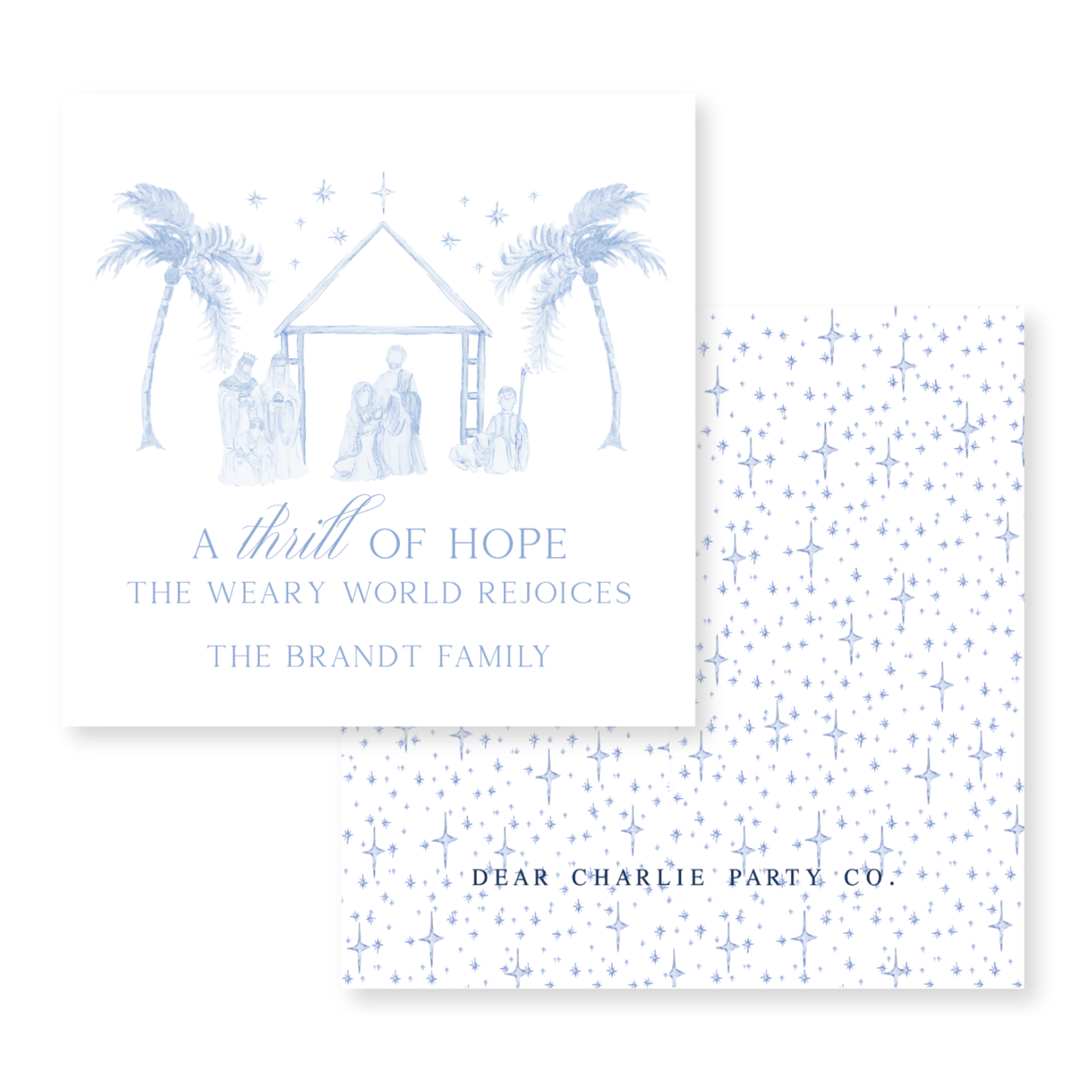 a christmas card with a nativity scene and palm trees