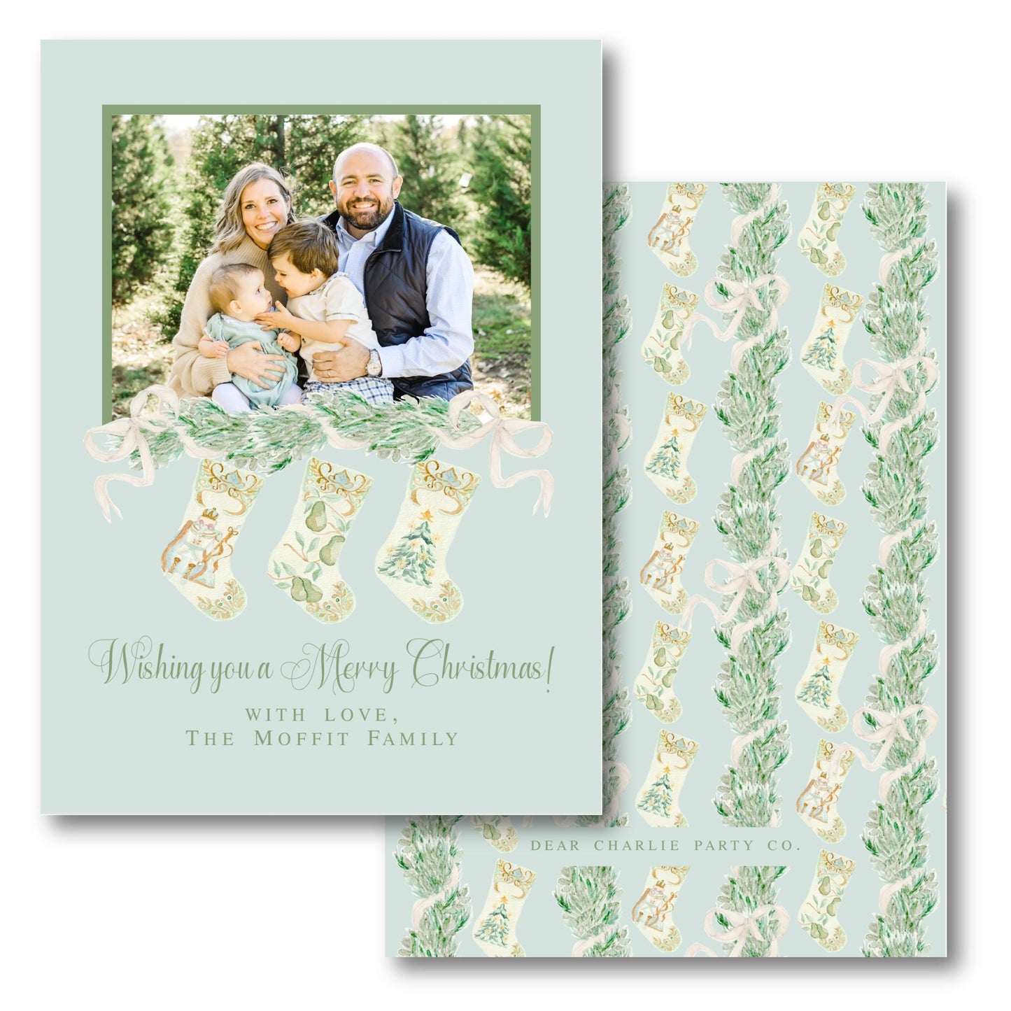 a christmas card with a photo of a man and woman