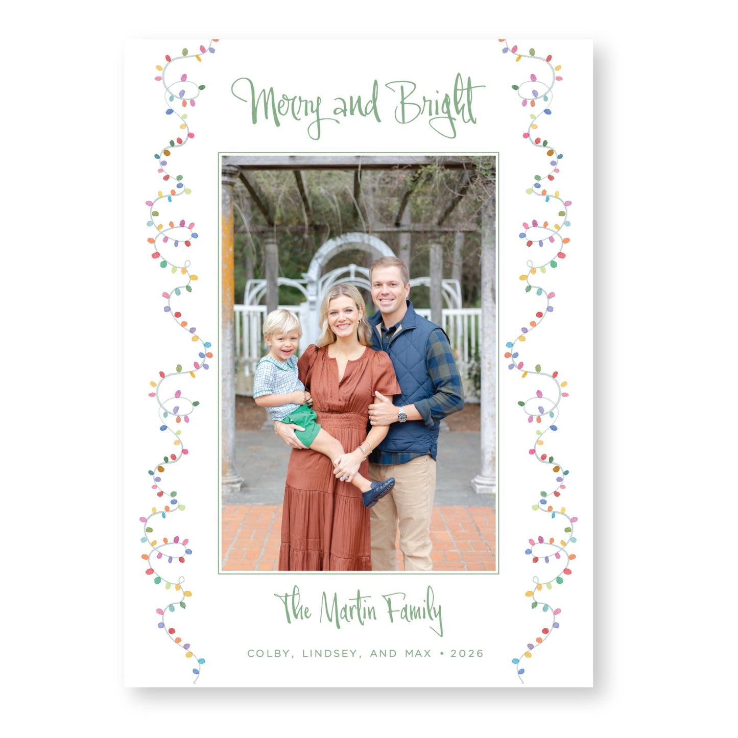 A family portrait of a man, woman, and child, with the text "Merry and Bright" and "The Martin Family" written above and below the photo.