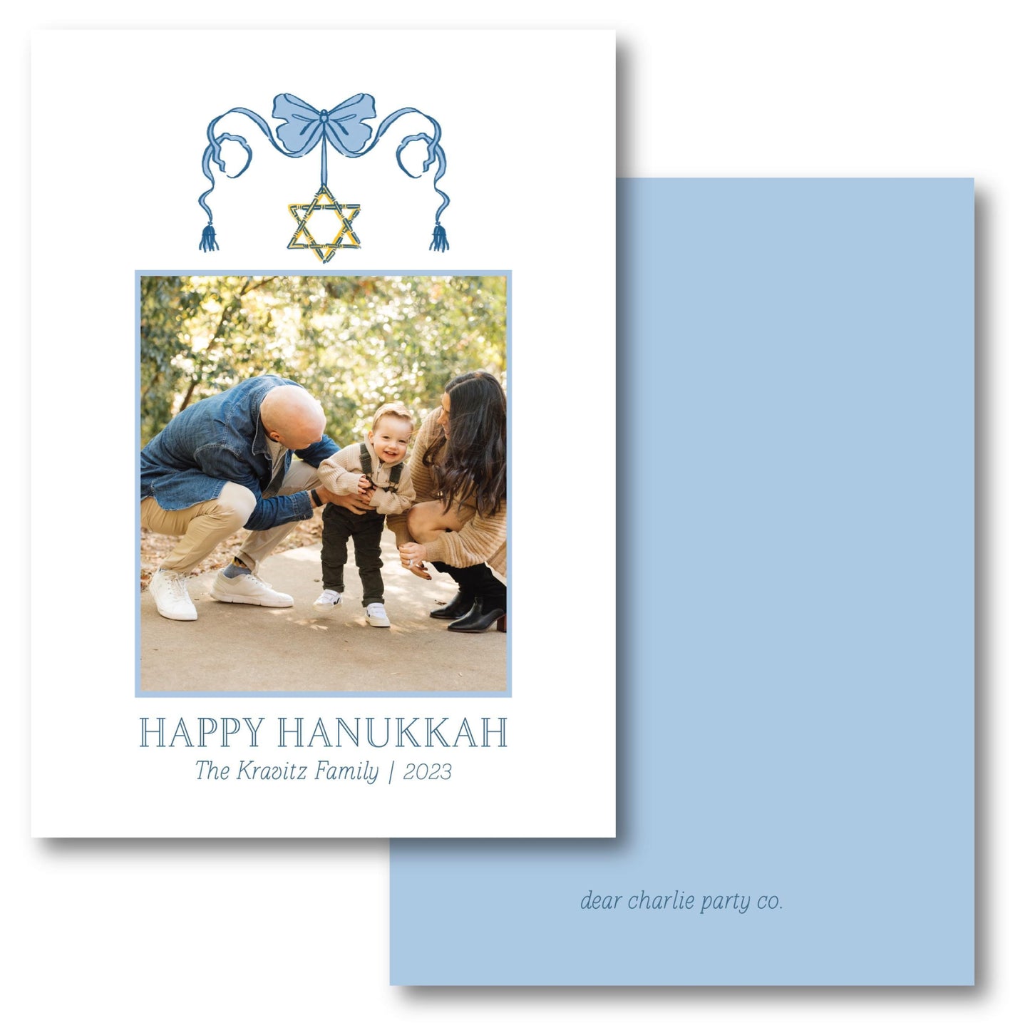 a happy hanukkah card with a picture of a family