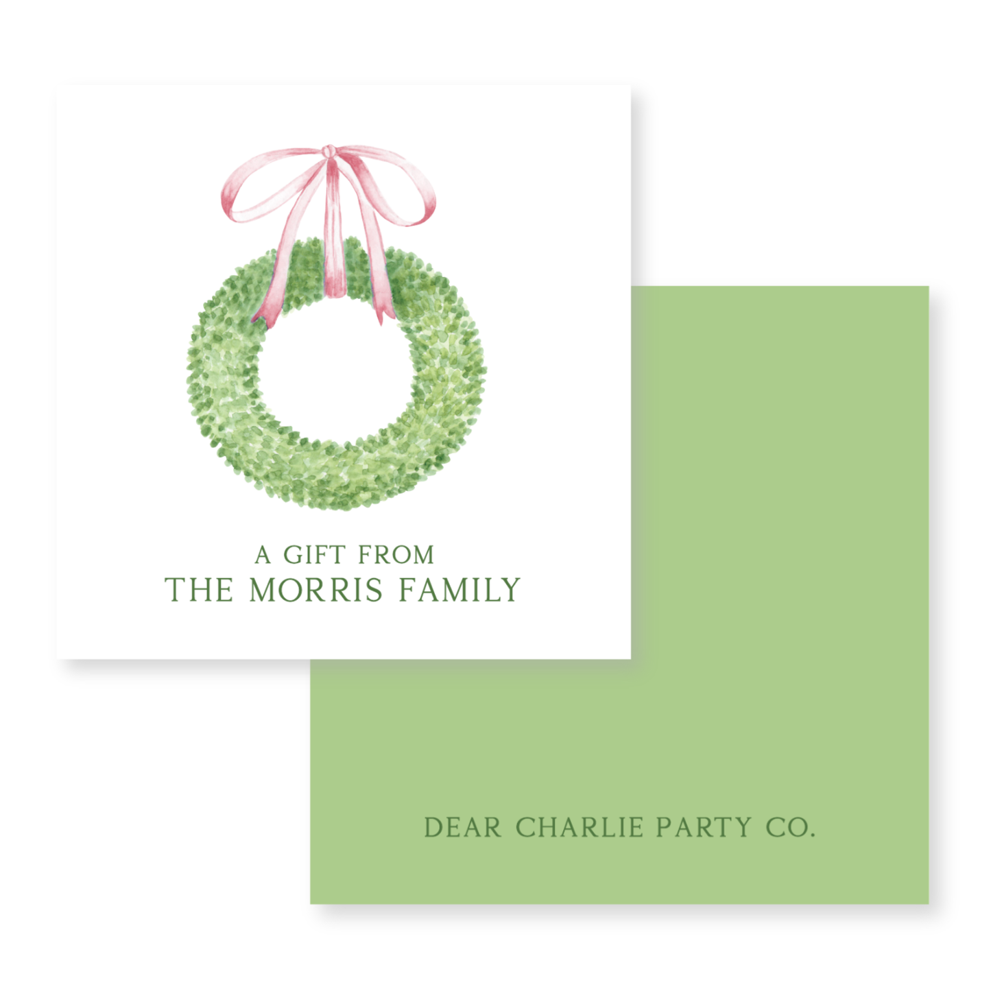 a christmas card with a wreath on it