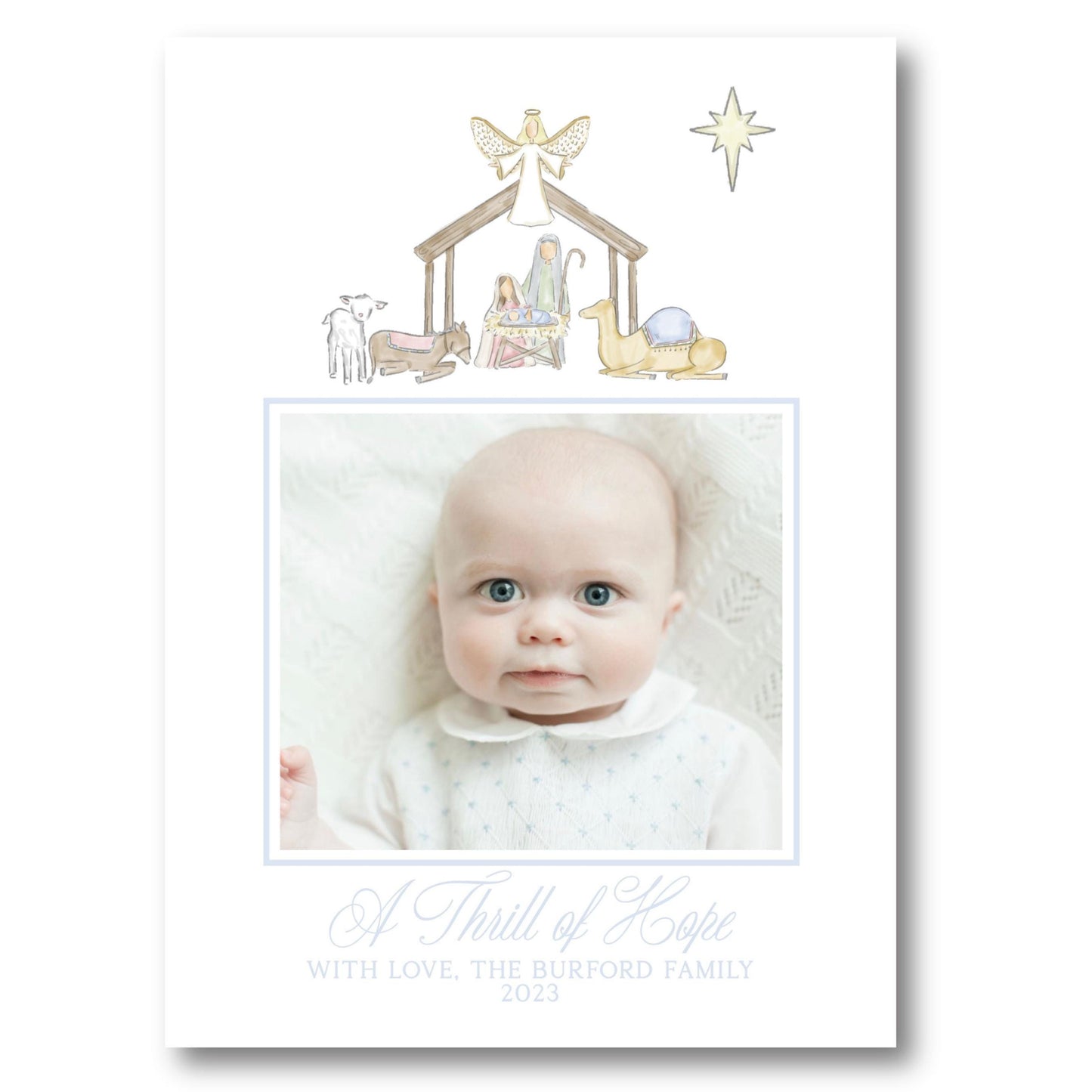 a christmas card with a picture of a baby in a nativity scene