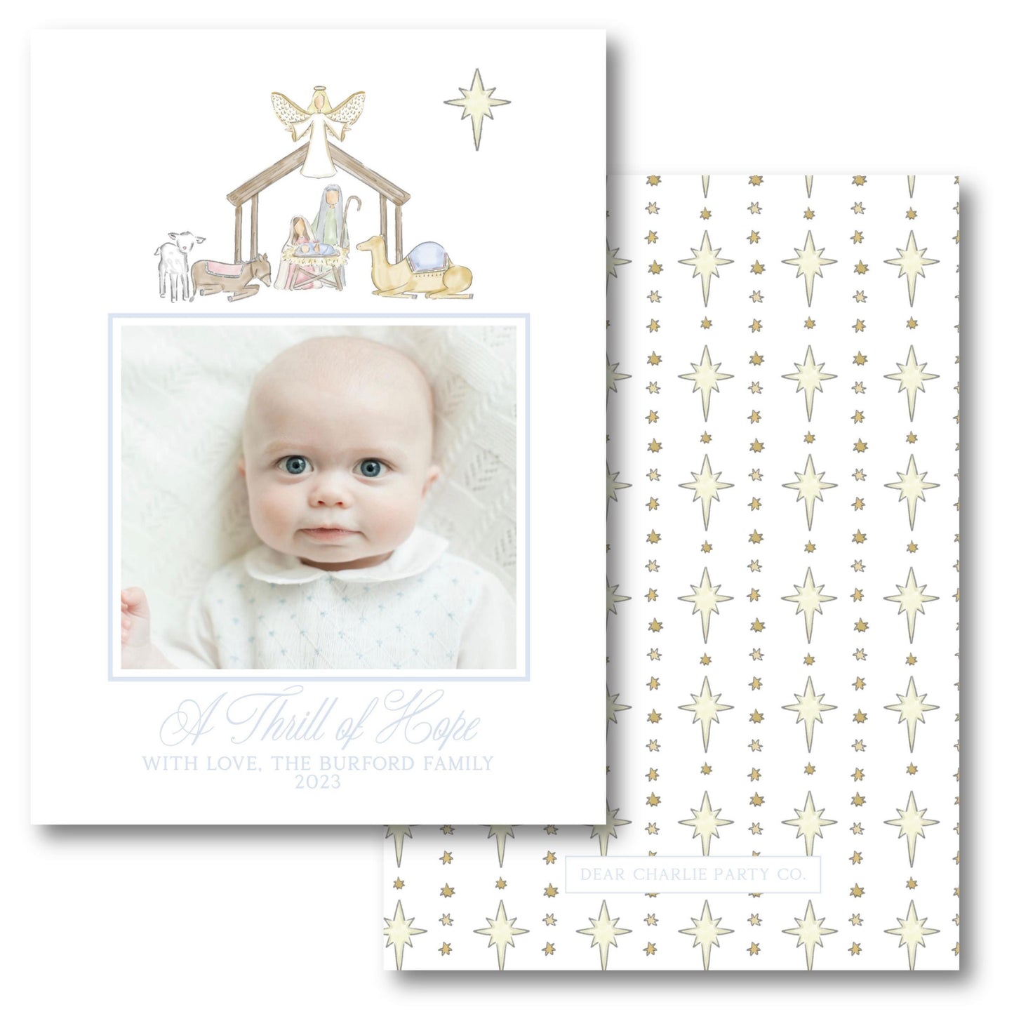 a christmas card with a picture of a baby in a nativity scene