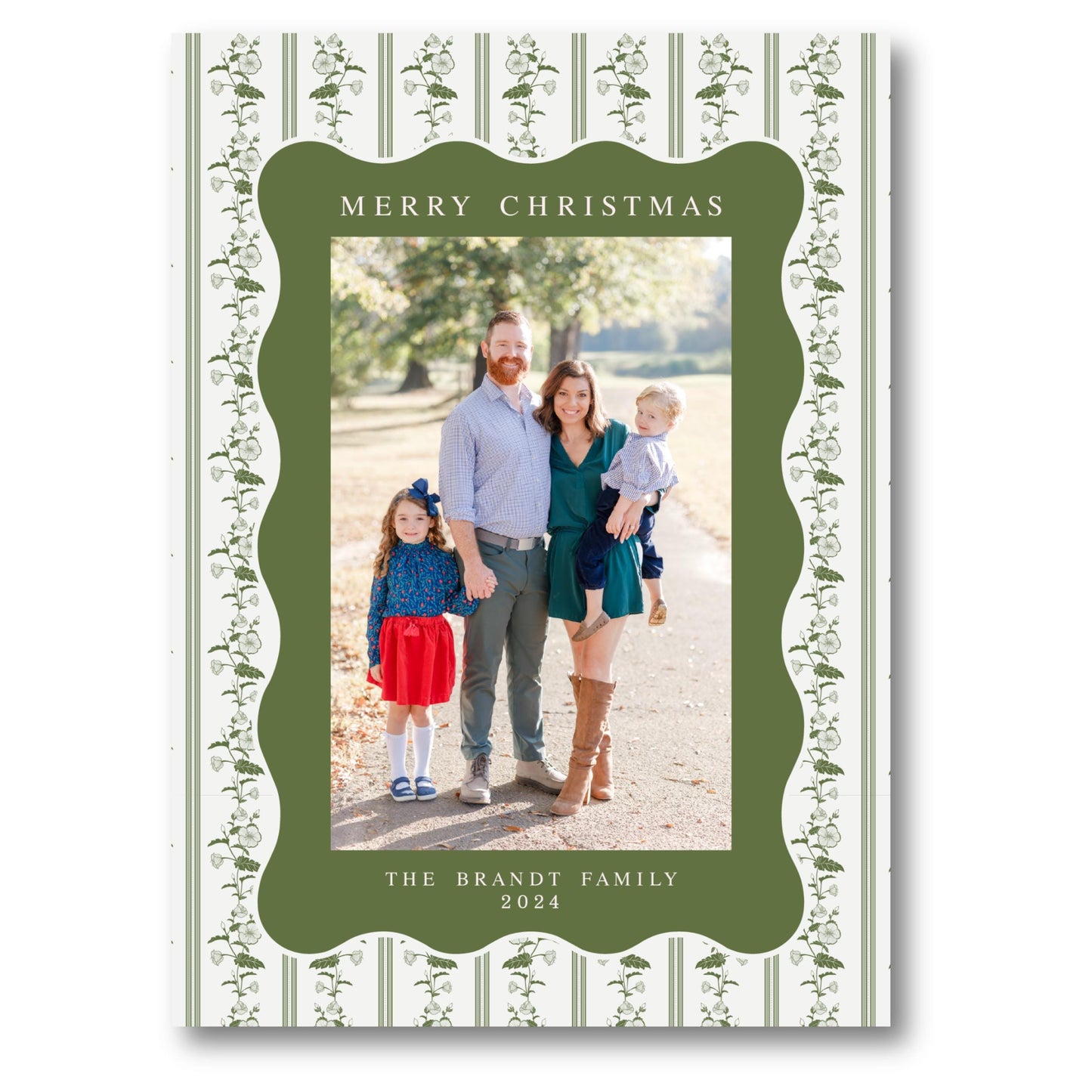 a family christmas card with a green border