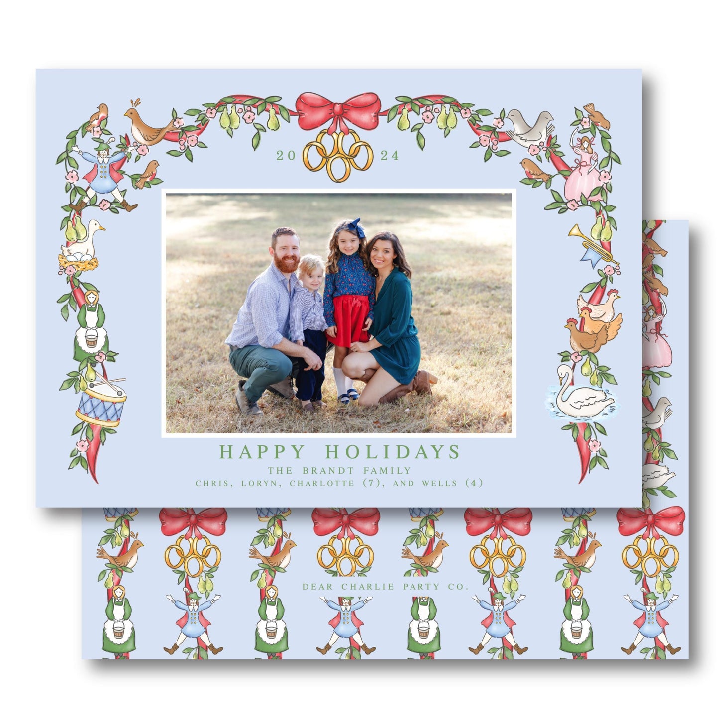 a christmas card with a picture of a family