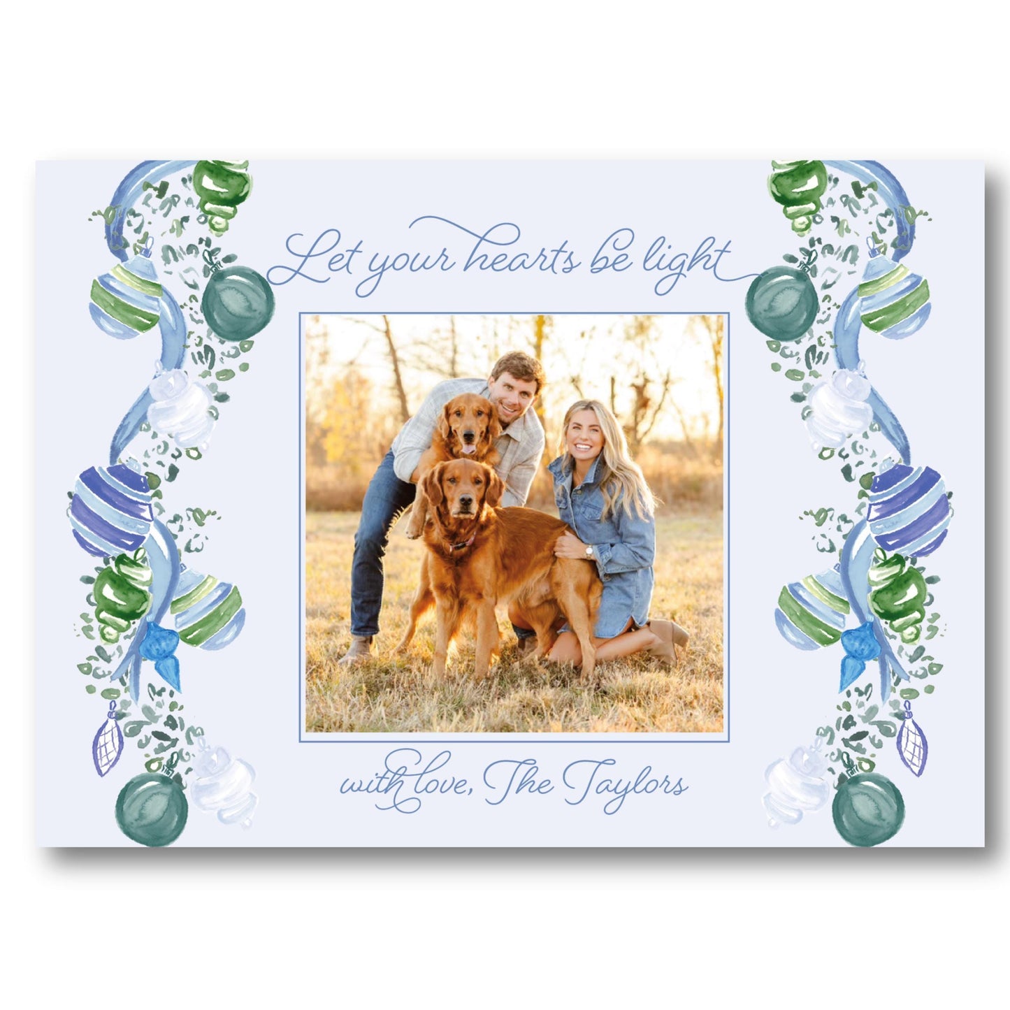 a picture frame with a picture of two people and a dog