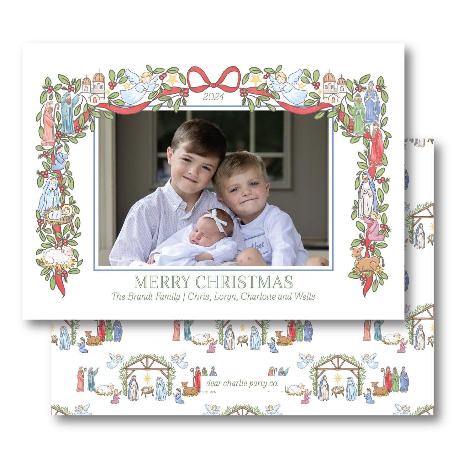 a christmas card with a picture of two children