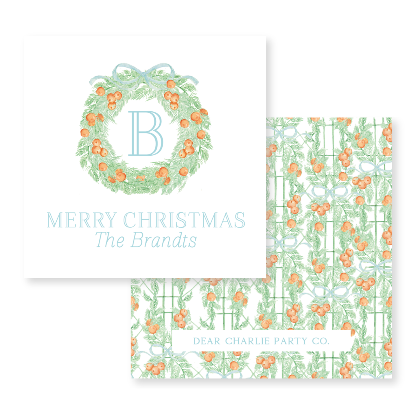 a christmas card with a wreath and orange flowers