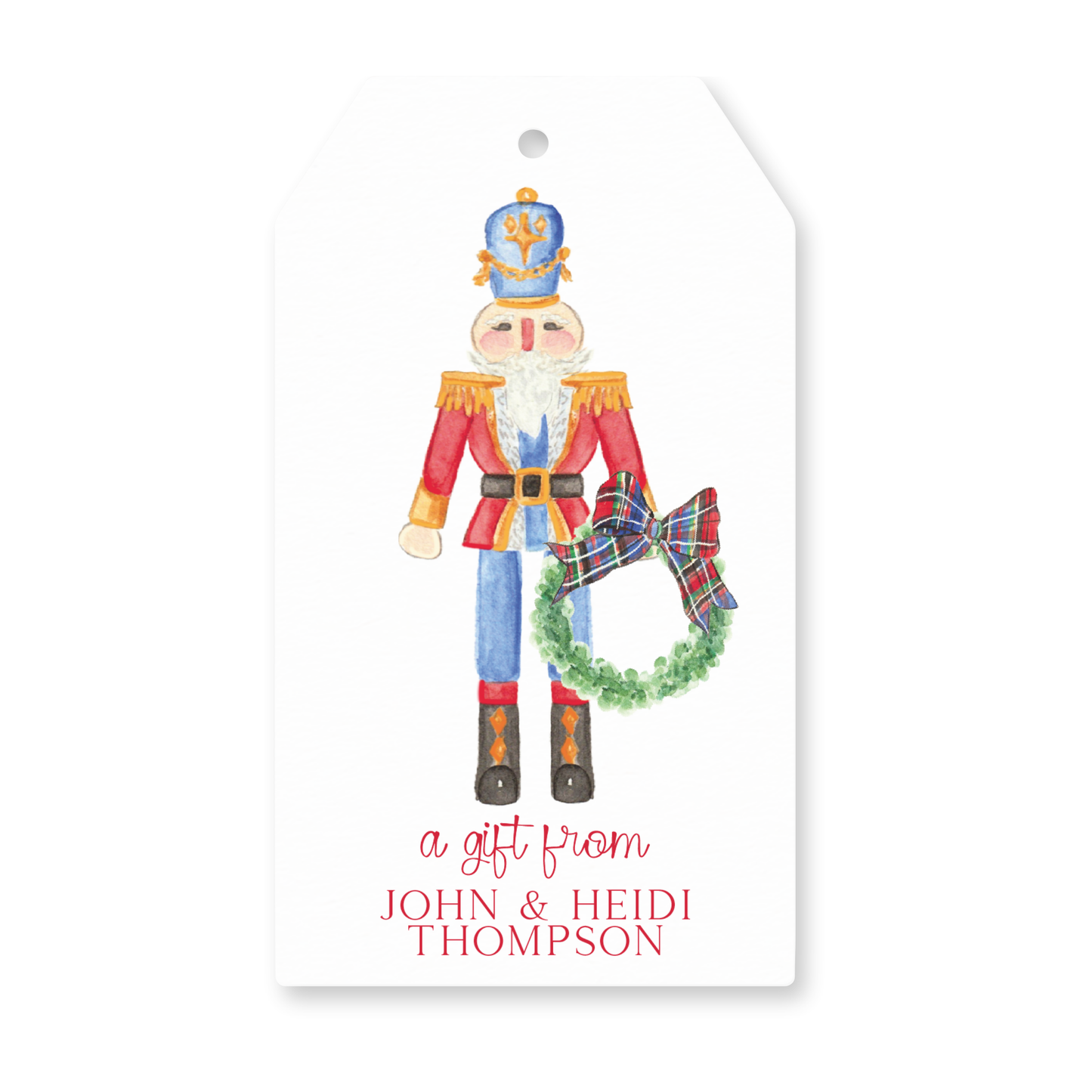 a gift tag with a watercolor nutcracker holding a wreath