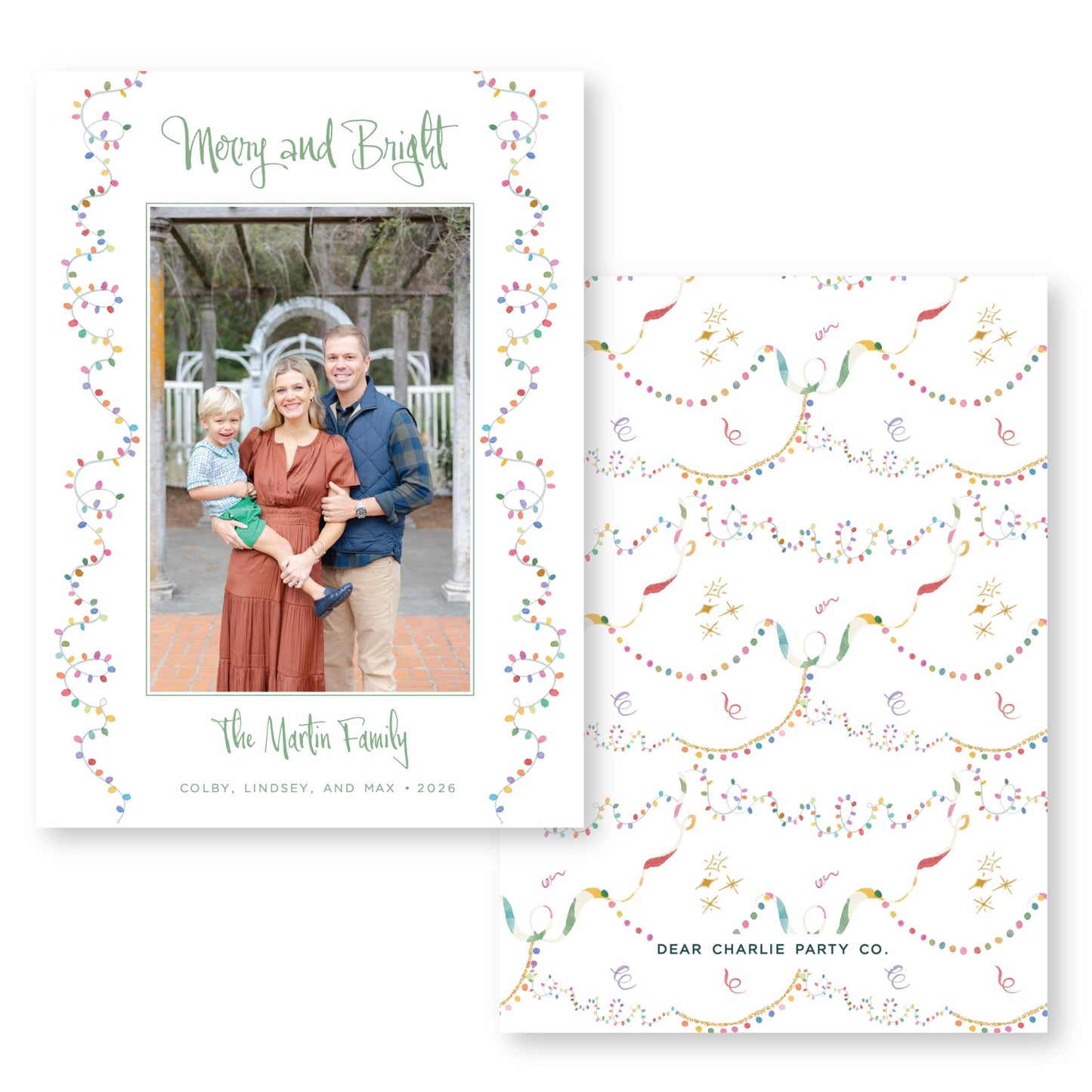 The image is a holiday card featuring a family portrait of a man, woman, and child. The card has a festive design with colorful lights and patterns surrounding the photo.