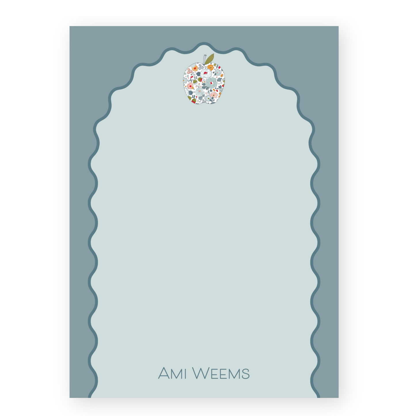 a card with an apple on top of it