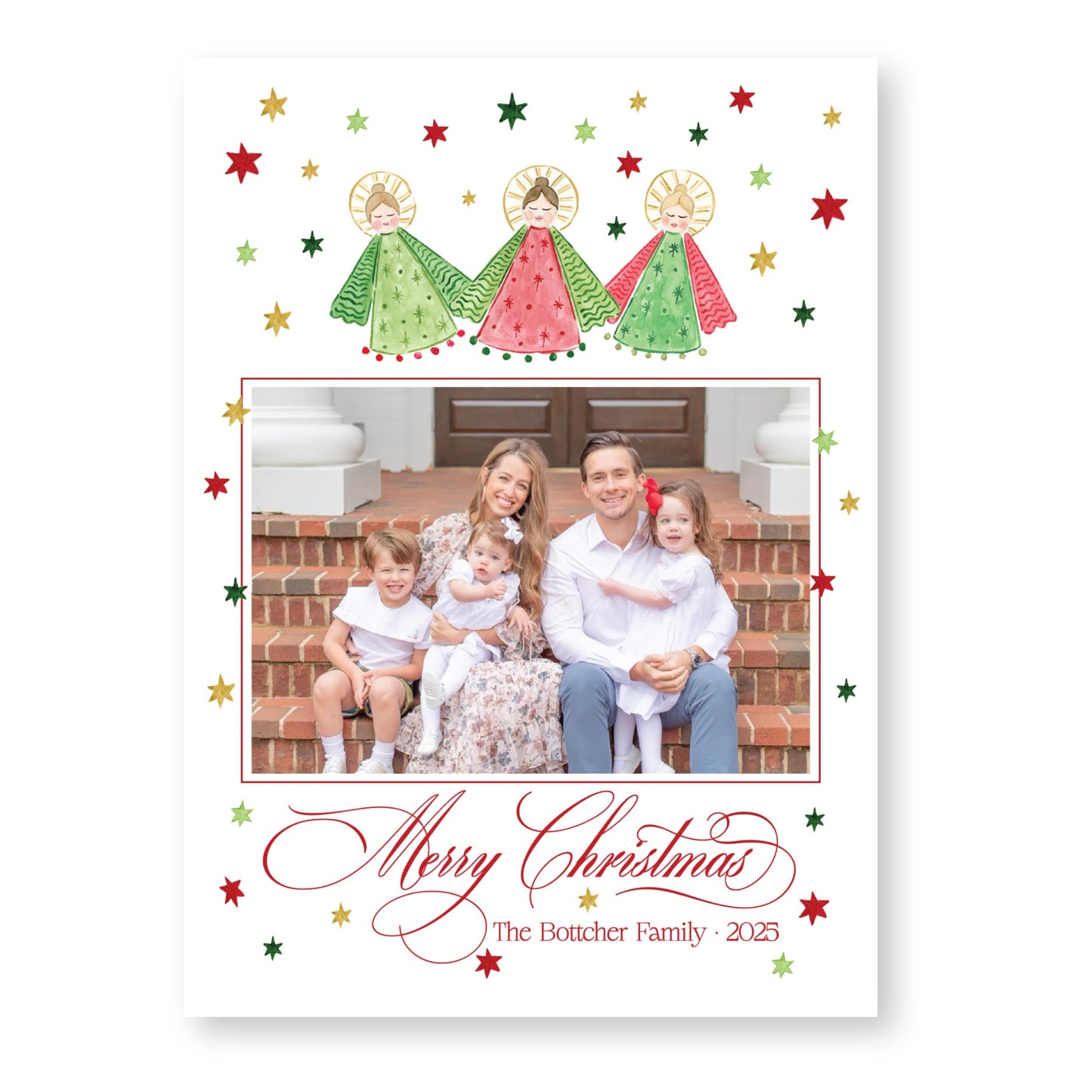 A family photo of a man, woman, and two children sitting on steps, surrounded by Christmas decorations and stars.