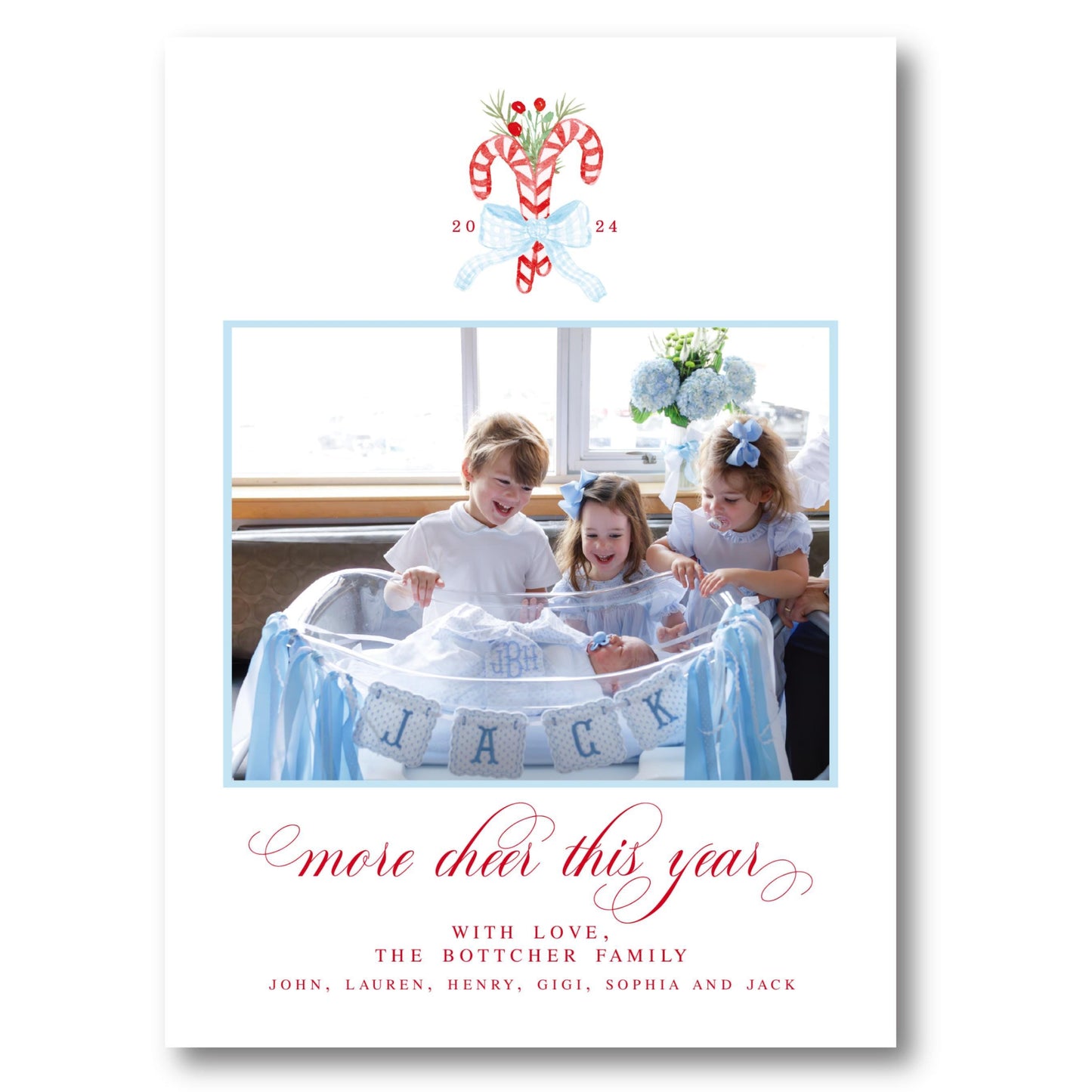 a christmas card with a picture of three children in a bathtub