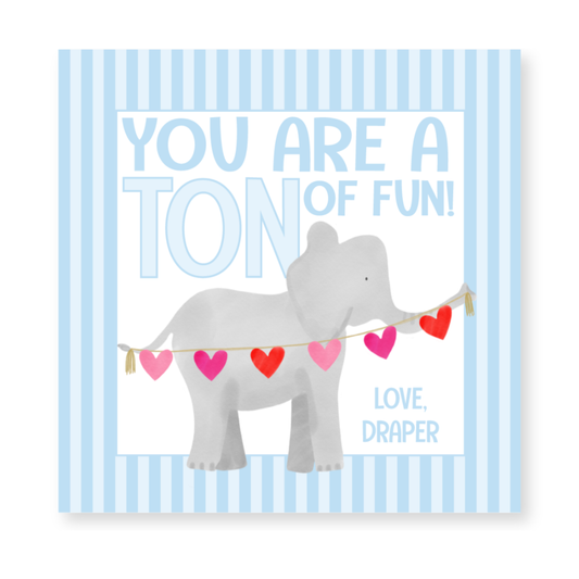 a card with an elephant holding a string of hearts