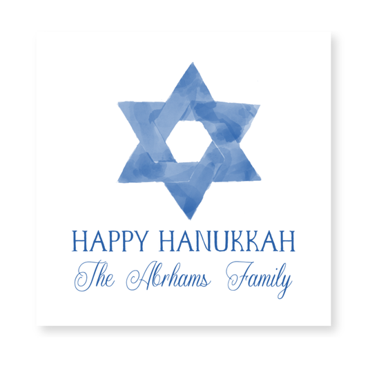 a hanukkah card with a star of david