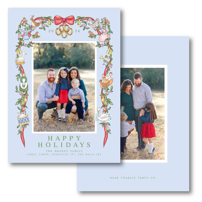 a holiday card with a picture of a family