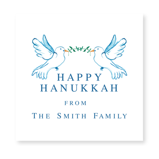 a white card with two birds and the words happy hanukkah from the