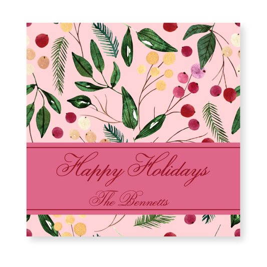a pink holiday card with leaves and berries