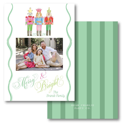 a christmas card with a family picture on it