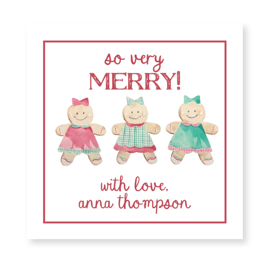 a christmas card with three dolls on it