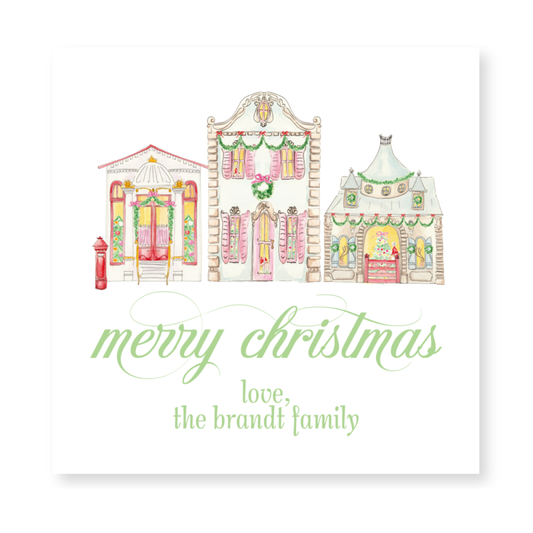 a christmas card with a house and a fire hydrant
