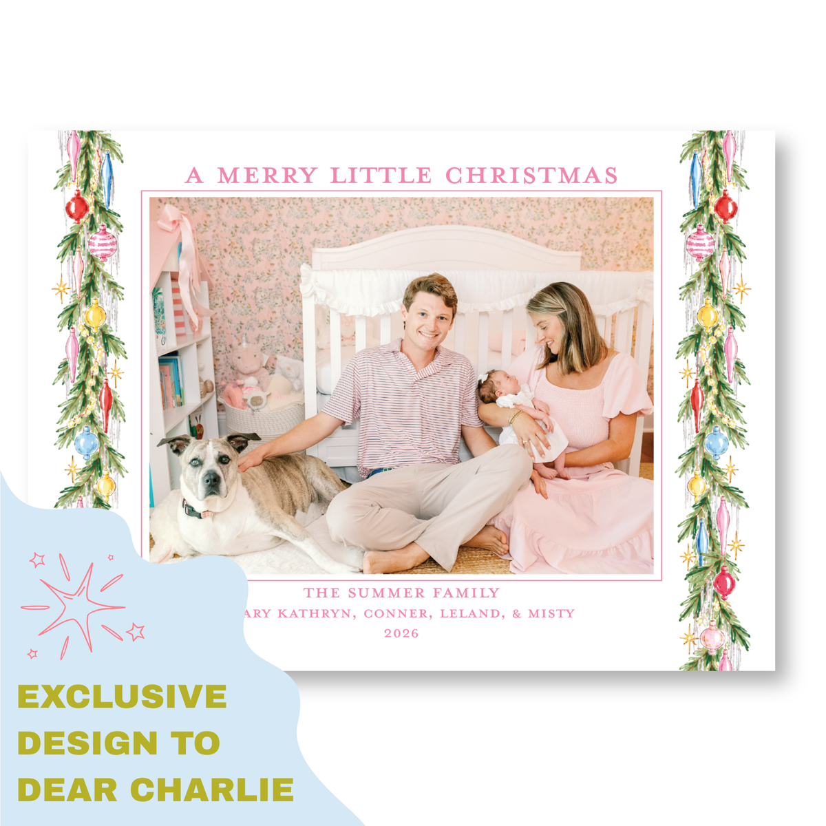 A family portrait of a couple and their newborn baby, with a dog in the background, is displayed in a frame. The text "A MERRY LITTLE CHRISTMAS" is written above the photo, and "THE SUMMER FAMILY" is written below the photo. The text "EXCLUSIVE DESIGN TO DEAR CHARLIE" is written at the bottom of the image.