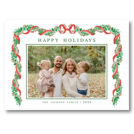 a holiday card with an image of a family