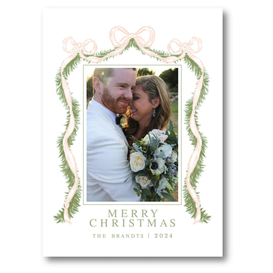 a christmas card with a photo of a couple