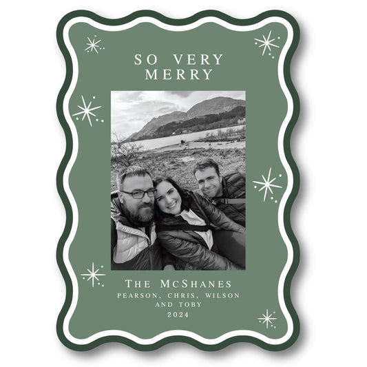 a christmas card with a picture of two people