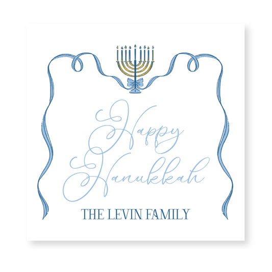 a hanukkah card with a menorah on it