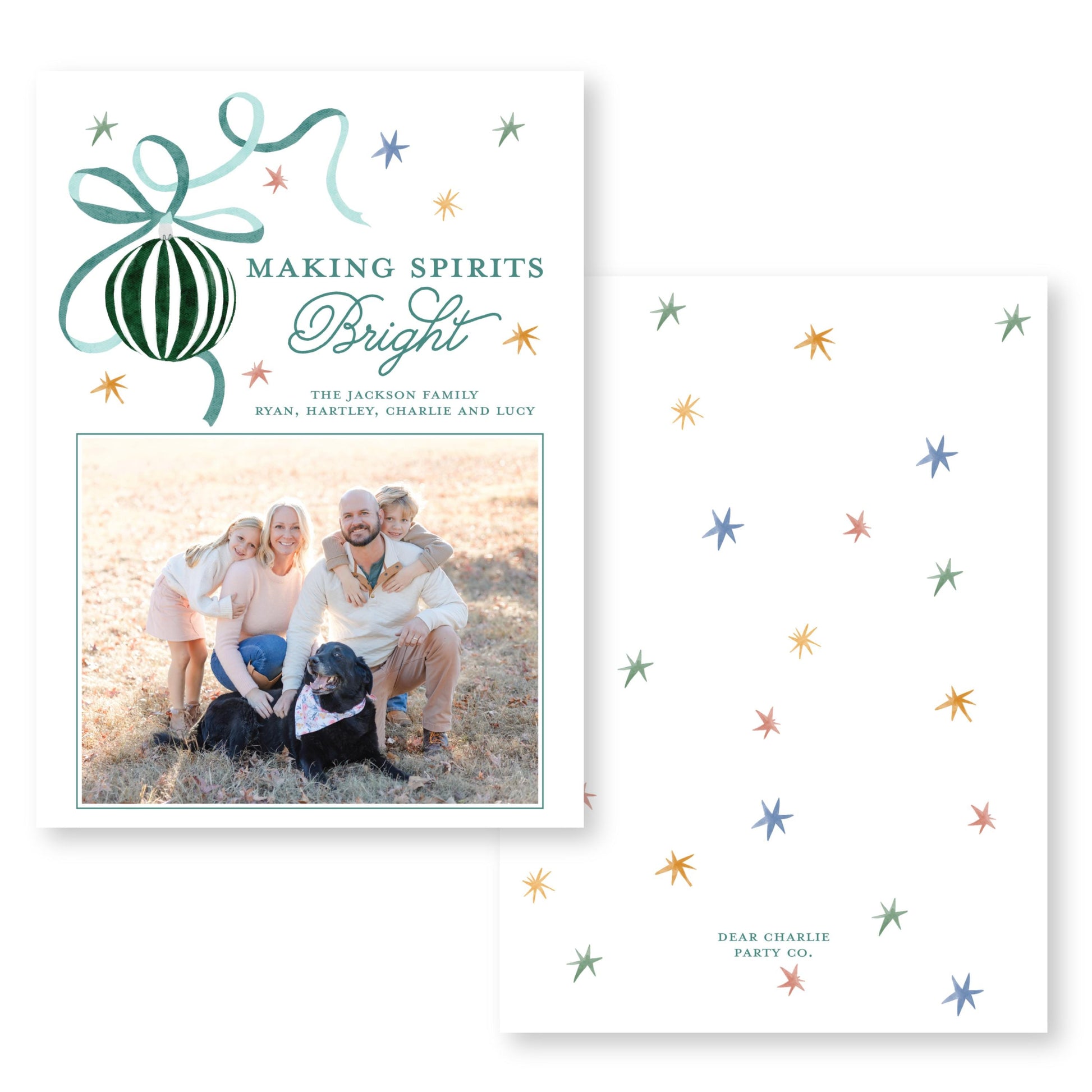 The image is a holiday card featuring a family photo of a man, woman, and two children posing together in a field. The card has a festive design with stars and a ribbon, and the text &quot;Making Spirits Bright&quot; and &quot;The Jackson Family&quot; is displayed.