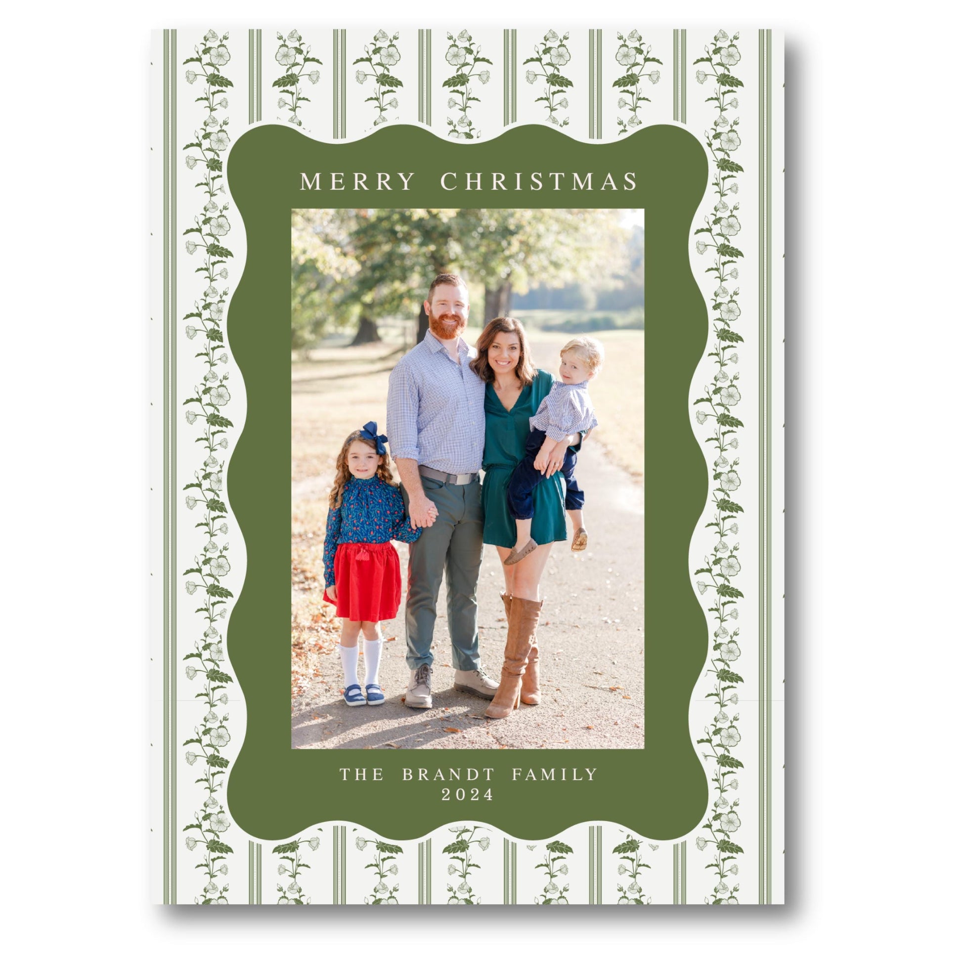 a family christmas card with a green border