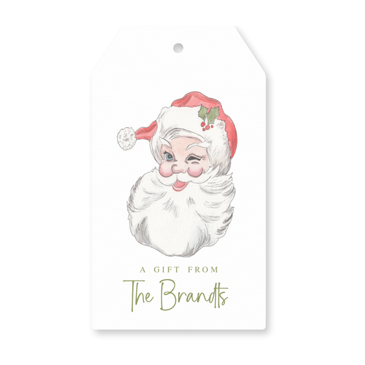 a gift tag with a picture of a santa claus