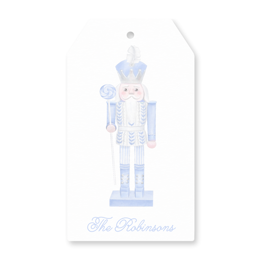 a tag with a picture of a nutcracker