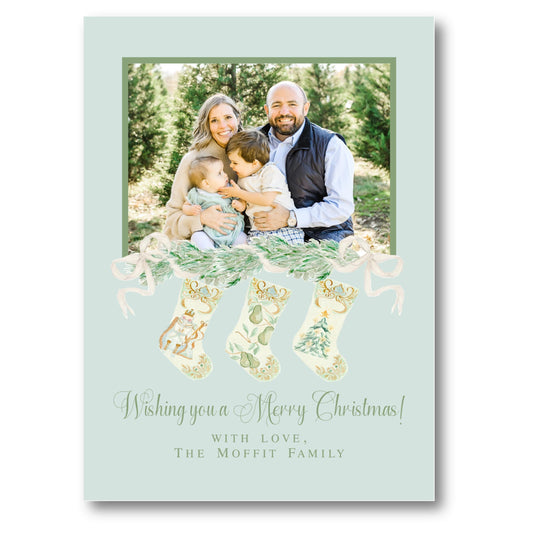 a family christmas card with stockings and stockings