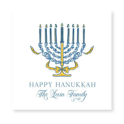 a hanukkah card with a menorah on it
