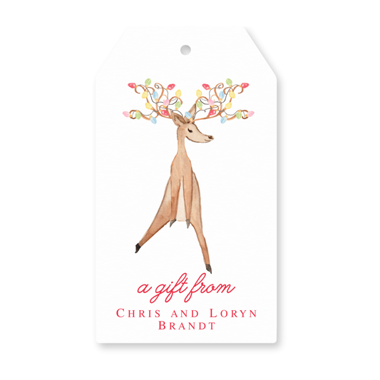 a gift tag with a watercolor deer on it