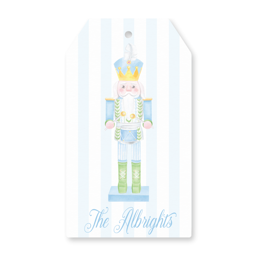 a gift tag with a picture of a nutcracker
