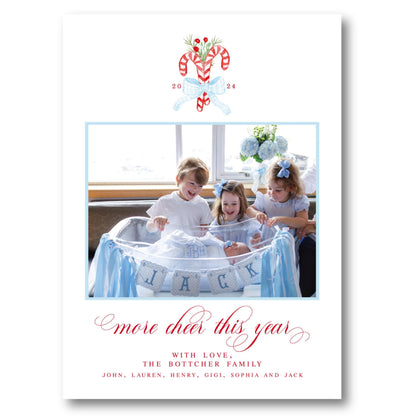 a christmas card with a picture of three children in a bathtub