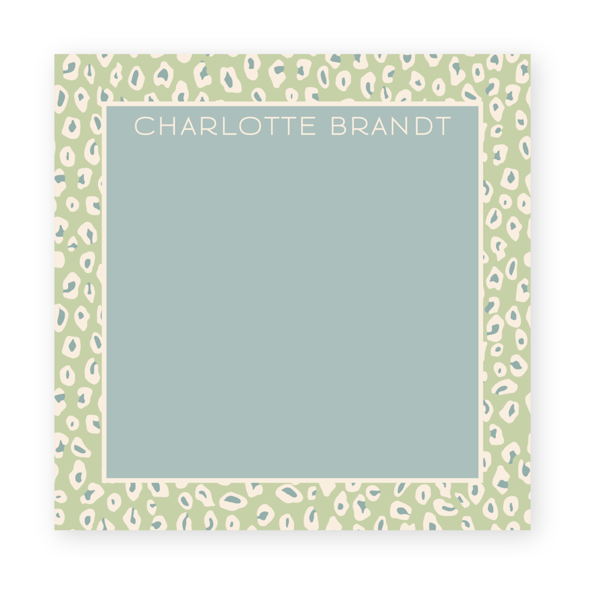 a green and white leopard print frame with the word charlotte brand