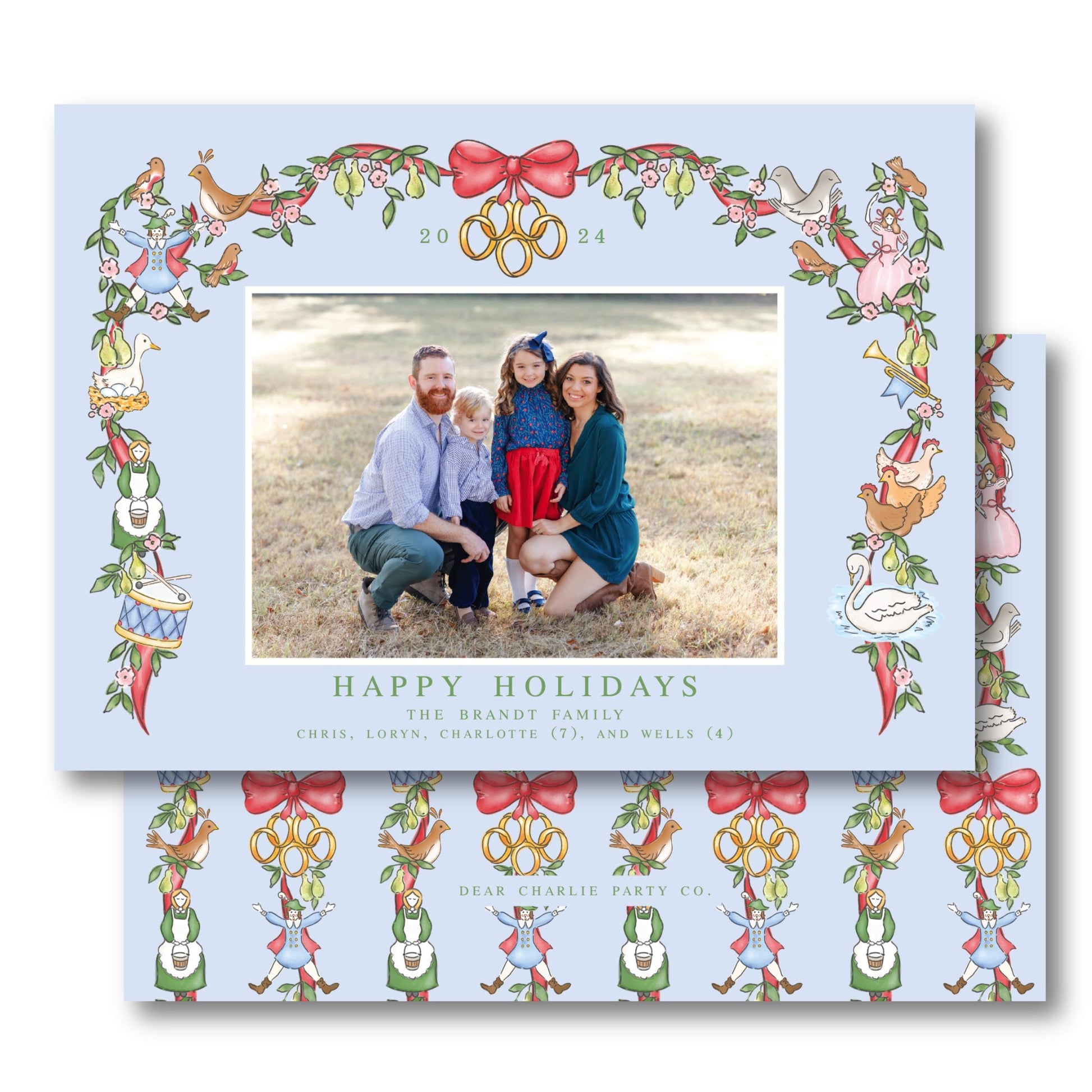 a christmas card with a picture of a family