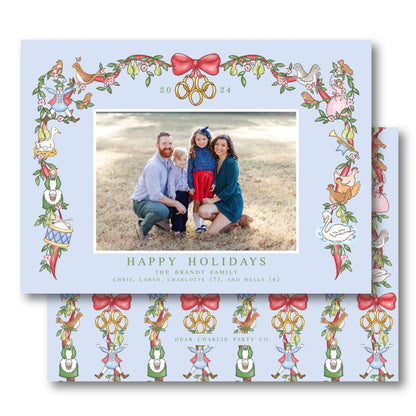 a christmas card with a picture of a family