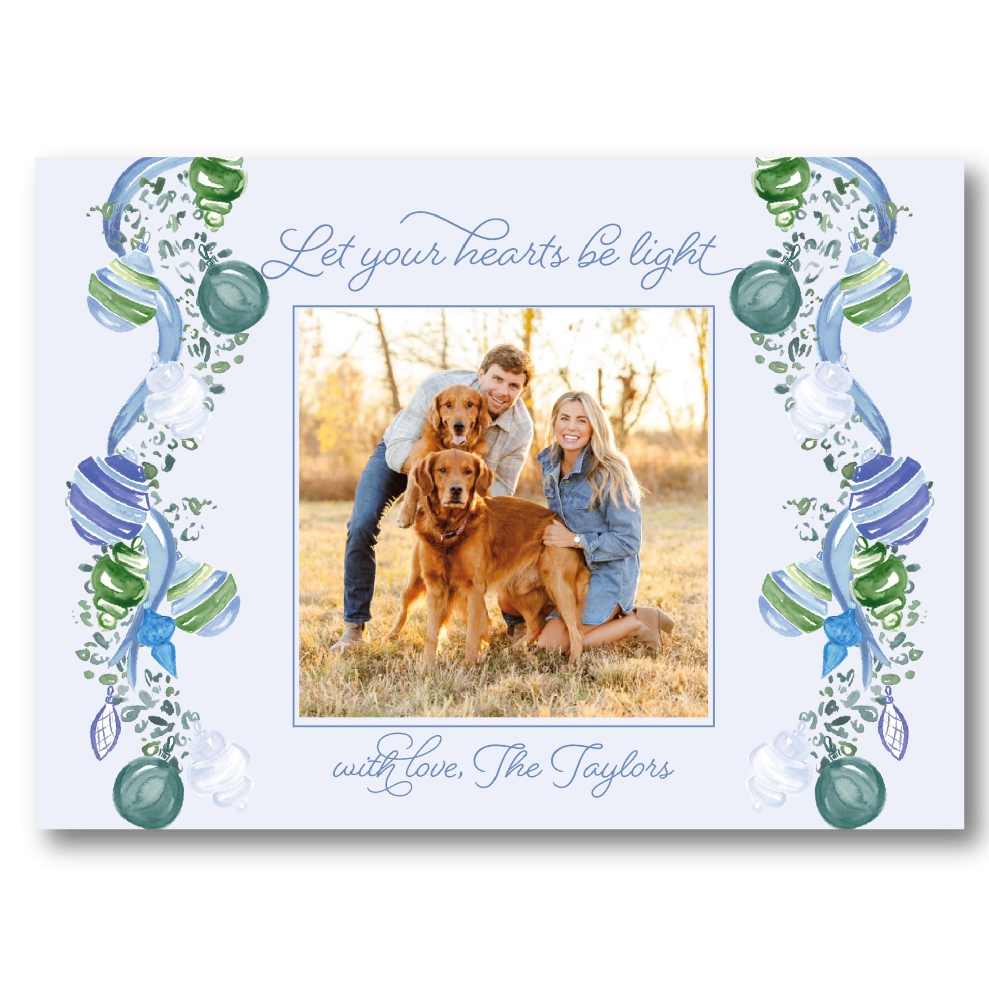 a picture frame with a picture of two people and a dog