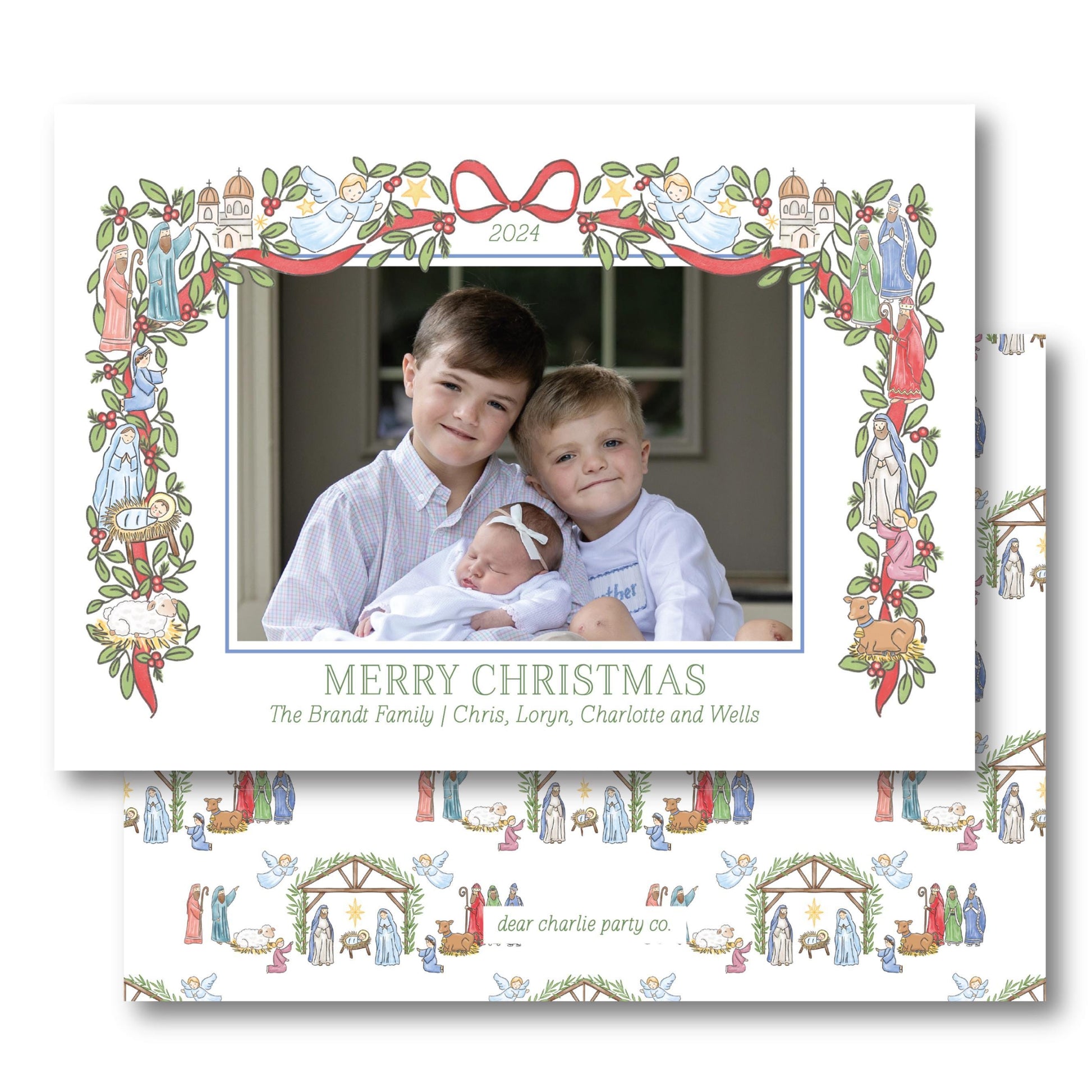 a christmas card with a picture of two children