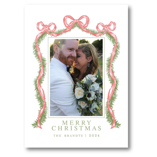 a christmas card with a picture of a couple