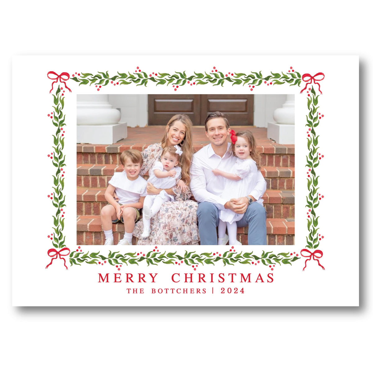 a christmas card with a family sitting on the steps