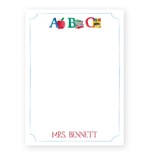 a white paper with the words abcg and an apple on it