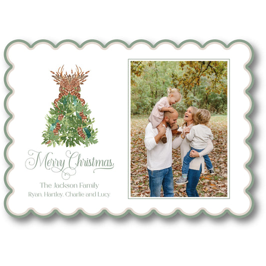 a christmas card with a christmas tree on it